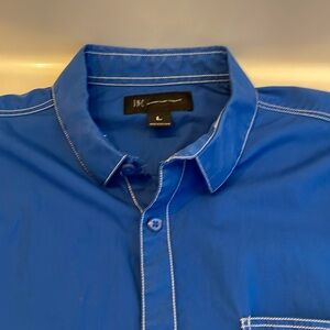 Very cool blue men’s button up shirt. Blue with white stitching.